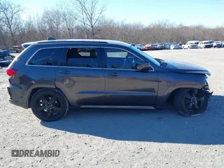 2015 Jeep Grand Cherokee Overland with VIN 1C4RJFCGXFC215750, listed as a IAAI auction lot 40795135 with 89,110 mi miles and . Bid and sale history available at DreamBid. Image 13.
