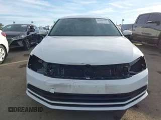 2016 Volkswagen Jetta Sedan 1.4T SE with VIN 3VWD67AJXGM365869, listed as a IAAI auction lot 41261109 with 59,325 mi miles. Bid and sale history available at carsss.com. Image 13.