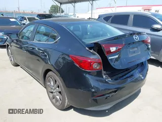 2018 Mazda 3 Touring z VIN 3MZBN1V33JM276803, wystawiony jako IAAI lot #42100422 z przebiegiem 41 802 mil mil oraz . Historia ofert i sprzedaży dostępna na DreamBid. Obrazek 3.