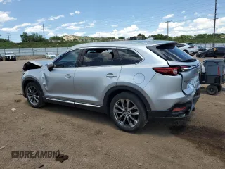 2016 Mazda CX-9 Grand Touring с VIN JM3TCADY2G0121026, выставлен на аукционе Copart как лот 60518105 с пробегом 104 923 миль миль и Списание • Salvage title. История ставок и продаж доступна на DreamBid. Изображение 2.