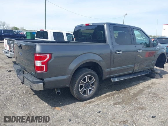 2018 Ford F-150 XL with VIN 1FTEW1CP2JFB50015, listed as a IAAI auction lot 41938177 with 248,137 mi miles and . Bid and sale history available at DreamBid. Image 4.