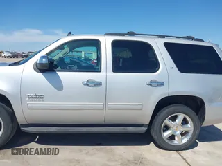 2013 Chevrolet Tahoe LT with VIN 1GNSCBE07DR164486, listed as a IAAI auction lot 42216421 with 220,395 mi miles and . Bid and sale history available at DreamBid. Image 14.