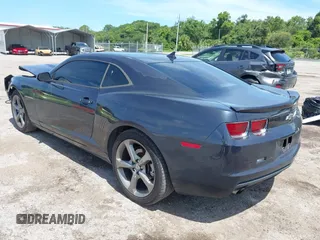 2013 Chevrolet Camaro LT with VIN 2G1FC1E38D9160609, listed as a IAAI auction lot 42646283 with 215,814 mi miles and . Bid and sale history available at DreamBid. Image 3.