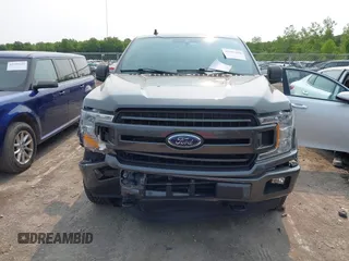 2020 Ford F-150 XL with VIN 1FTEW1EP1LFC21317, listed as a IAAI auction lot 42391410 with 77,999 mi miles and . Bid and sale history available at DreamBid. Image 12.