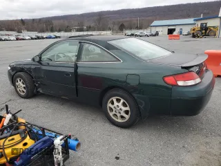 2001 Toyota Solara SE with VIN 2T1CG22P41C458632, listed as a Copart auction lot 86082504 with 199,972 mi miles and Salvage Title. Bid and sale history available at carsss.com. Image 2.