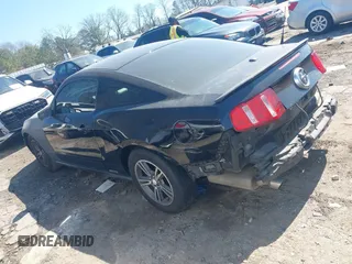2012 Ford Mustang V6 Premium with VIN 1ZVBP8AM7C5274479, listed as a IAAI auction lot 41772945 with 174,759 mi miles. Bid and sale history available at carsss.com. Image 13.