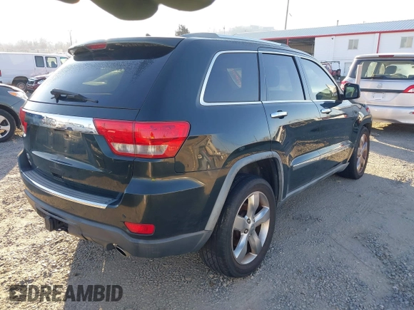 2011 Jeep Grand Cherokee Overland with VIN 1J4RS6GT3BC583261, listed as a IAAI auction lot 41265641 with 184,984 mi miles and . Bid and sale history available at DreamBid. Image 4.