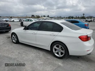 2015 BMW 3 Series 328i with VIN WBA3C1C55FK120405, listed as a Copart auction lot 54374035 with 121,411 mi miles and Salvage title. Bid and sale history available at DreamBid. Image 2.