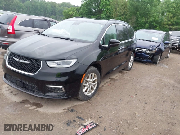 2022 Chrysler Pacifica Touring L with VIN 2C4RC1BG3NR106311, listed as a IAAI auction lot 42158651 with 68,473 mi miles and . Bid and sale history available at DreamBid. Image 18.