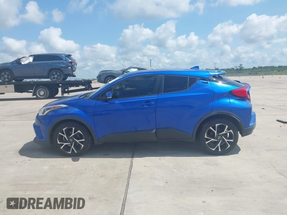 2018 Toyota C-HR XLE z VIN NMTKHMBX5JR057407, wystawiony jako IAAI lot #42363412 z przebiegiem 155 673 mil mil oraz . Historia ofert i sprzedaży dostępna na DreamBid. Obrazek 14.