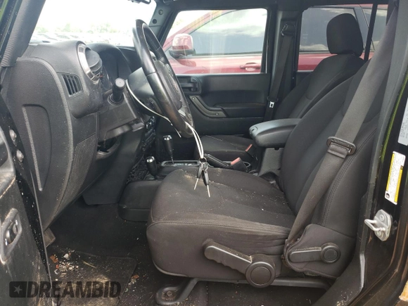 2018 Jeep Wrangler JK Unlimited Sport S with VIN 1C4BJWDG3JL906904, listed as a Copart auction lot 62789794 with 73,464 mi miles and Salvage Title. Bid and sale history available at carsss.com. Image 7.