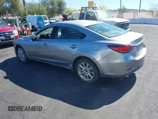 2014 Mazda 6 i Sport with VIN JM1GJ1U61E1151348, listed as a IAAI auction lot 42248173 with 275,764 mi miles and . Bid and sale history available at DreamBid. Image 3.