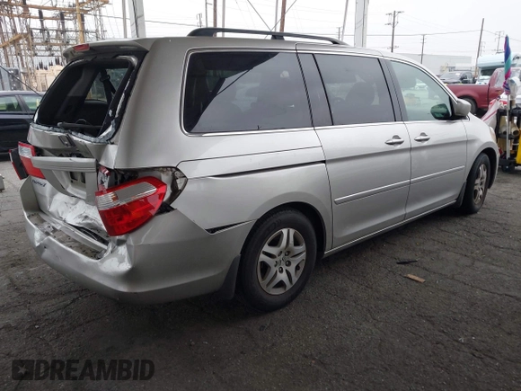 2007 Honda Odyssey EX with VIN 5FNRL38477B432832, listed as a IAAI auction lot 42153673 with 133,652 mi miles and . Bid and sale history available at DreamBid. Image 4.
