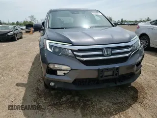 2017 Honda Pilot EX-L z VIN 5FNYF6H61HB061139, wystawiony jako Copart lot #55593095 z przebiegiem 107 170 mil mil oraz Szkoda całkowita • Salvage title. Historia ofert i sprzedaży dostępna na DreamBid. Obrazek 13.