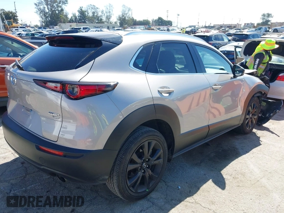 2022 Mazda CX-30 2.5 Turbo Premium Package with VIN 3MVDMBDY2NM408844, listed as a IAAI auction lot 41668027 with 17,463 mi miles. Bid and sale history available at carsss.com. Image 4.