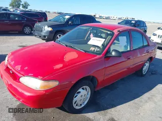 2000 Ford Escort Fleet with VIN 3FAFP13P8YR209122, listed as a IAAI auction lot 40254803 with 147,382 mi miles. Bid and sale history available at carsss.com. Image 2.