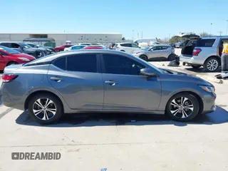 2020 Nissan Sentra SV with VIN 3N1AB8CV0LY311798, listed as a IAAI auction lot 41759594 with 53,487 mi miles and . Bid and sale history available at DreamBid. Image 12.