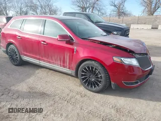 2014 Lincoln MKT EcoBoost with VIN 2LMHJ5ATXEBL58430, listed as a IAAI auction lot 41657571 with 58,502 mi miles and . Bid and sale history available at DreamBid. Image 1.