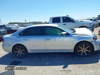 2015 Volkswagen Passat 1.8T Limited Edition with VIN 1VWAT7A30FC014689, listed as a IAAI auction lot 41758748 with 140,545 mi miles. Bid and sale history available at carsss.com. Image 14.