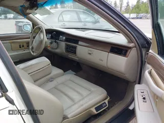 1995 Cadillac DeVille z VIN 1G6KD52B1SU278042, wystawiony jako IAAI lot #42142667 z przebiegiem 79 943 mil mil oraz . Historia ofert i sprzedaży dostępna na DreamBid. Obrazek 5.