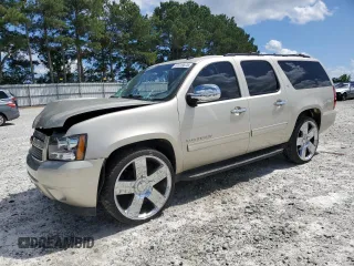 2013 Chevrolet Suburban LT with VIN 1GNSCJE06DR290395, listed as a Copart auction lot 61279575 with 250,302 mi miles and Salvage title. Bid and sale history available at DreamBid. Image 1.