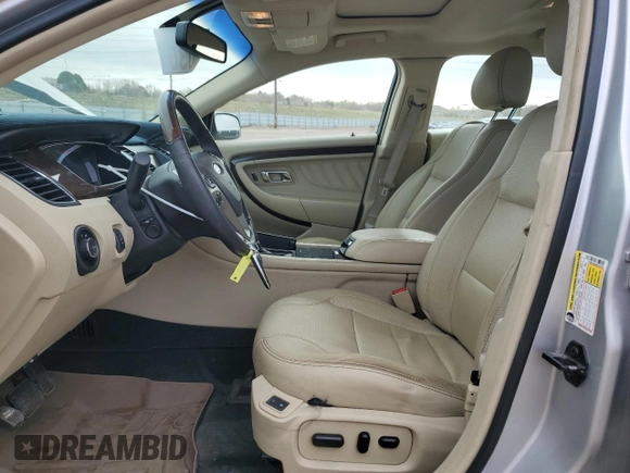 2013 Ford Taurus Limited with VIN 1FAHP2F82DG235526, listed as a Copart auction lot 52051365 with 106,459 mi miles and Salvage Title. Bid and sale history available at DreamBid. Image 7.