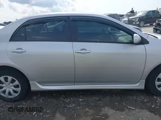 2010 Toyota Corolla with VIN 1NXBU4EE1AZ341809, listed as a IAAI auction lot 42482159 with 193,706 mi miles and . Bid and sale history available at DreamBid. Image 14.