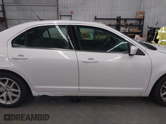 2012 Ford Fusion SEL z VIN 3FAHP0JAXCR104902, wystawiony jako IAAI lot #42471136 z przebiegiem 186 468 mil mil oraz . Historia ofert i sprzedaży dostępna na DreamBid. Obrazek 13.