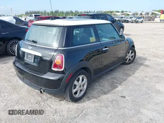 2010 MINI Hardtop with VIN WMWMF3C5XATU77265, listed as a IAAI auction lot 42007797 with 28,856 mi miles and . Bid and sale history available at DreamBid. Image 4.