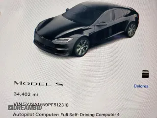 2023 Tesla Model S with VIN 5YJSA1E59PF512318, listed as a Copart auction lot 58377895 with 34,402 mi miles and Salvage title. Bid and sale history available at DreamBid. Image 9.