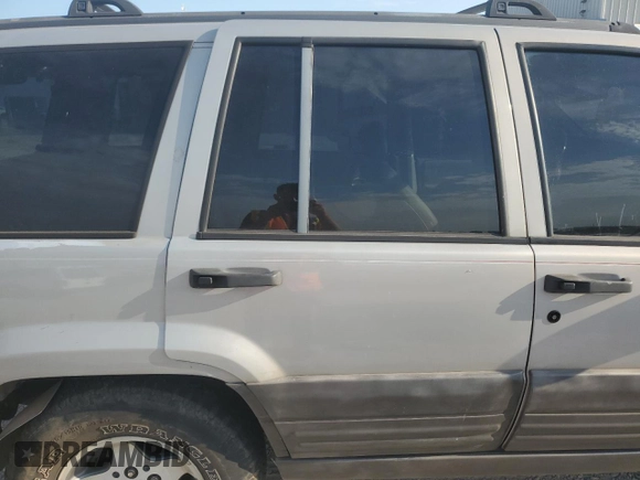 1998 Jeep Grand Cherokee Laredo with VIN 1J4GZ58S8WC301754, listed as a Copart auction lot 69698144 with 205,739 mi miles and Non Repairable. Bid and sale history available at carsss.com. Image 10.