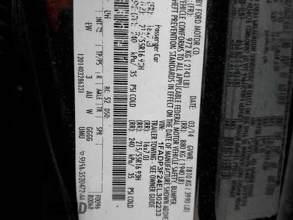 2014 Ford Focus SE with VIN 1FADP3F24EL302233, listed as a Copart auction lot 50596735 with 163,675 mi miles and Salvage Title. Bid and sale history available at carsss.com. Image 13.