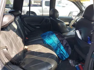 1999 Jeep Grand Cherokee Laredo z VIN 1J4G258S1XC787295, wystawiony jako IAAI lot #40450680 z przebiegiem Nie podano mil oraz . Historia ofert i sprzedaży dostępna na DreamBid. Obrazek 8.