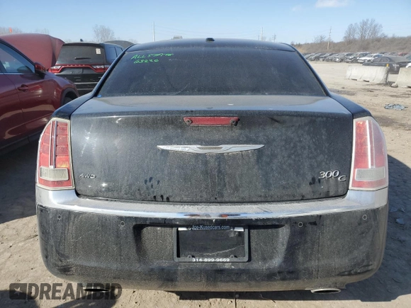 2013 Chrysler 300 C z VIN 2C3CCAKT4DH600916, wystawiony jako Copart lot #42281255 z przebiegiem 173 998 mil mil oraz Szkoda całkowita • Salvage title. Historia ofert i sprzedaży dostępna na DreamBid. Obrazek 6.