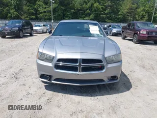 2013 Dodge Charger SE z VIN 2C3CDXBG0DH639988, wystawiony jako IAAI lot #40032112 z przebiegiem 197 941 mil mil oraz . Historia ofert i sprzedaży dostępna na DreamBid. Obrazek 6.