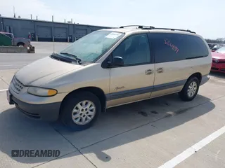 1999 Plymouth Voyager Grand SE z VIN 1P4GP44G0XB613853, wystawiony jako IAAI lot #42064199 z przebiegiem 175 050 mil mil oraz . Historia ofert i sprzedaży dostępna na DreamBid. Obrazek 2.