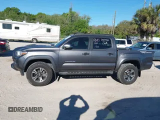 2017 Toyota Tacoma SR5 with VIN 5TFAZ5CNXHX050289, listed as a IAAI auction lot 41771576 with 68,735 mi miles and . Bid and sale history available at carsss.com. Image 15.