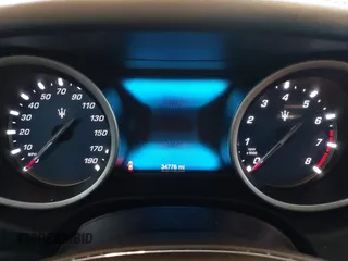 2017 Maserati Ghibli with VIN ZAM57XSLXH1238134, listed as a IAAI auction lot 41871754 with 34,776 mi miles. Bid and sale history available at carsss.com. Image 7.