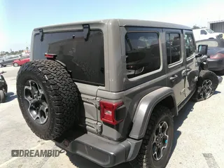 2022 Jeep Wrangler Unlimited Rubicon with VIN 1C4JJXR60NW182756, listed as a IAAI auction lot 36927414 with Not provided miles and . Bid and sale history available at DreamBid. Image 4.
