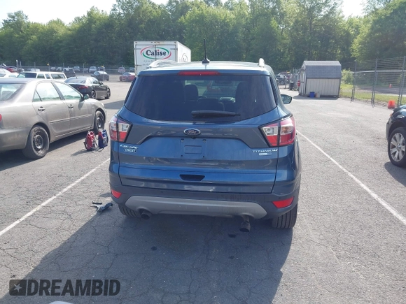 2018 Ford Escape Titanium with VIN 1FMCU9J92JUB01162, listed as a IAAI auction lot 42495112 with 96,280 mi miles and . Bid and sale history available at DreamBid. Image 17.
