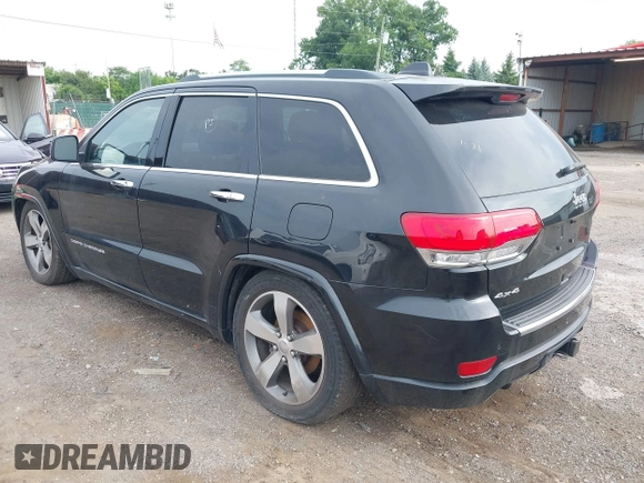 2015 Jeep Grand Cherokee High Altitude with VIN 1C4RJFCGXFC604663, listed as a IAAI auction lot 42816306 with 117,467 mi miles and . Bid and sale history available at DreamBid. Image 3.