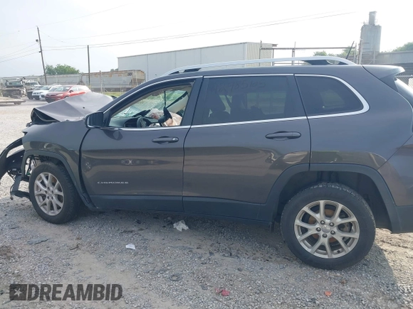 2017 Jeep Cherokee Latitude z VIN 1C4PJLCB3HW662626, wystawiony jako IAAI lot #42485105 z przebiegiem Nie podano mil oraz . Historia ofert i sprzedaży dostępna na DreamBid. Obrazek 14.