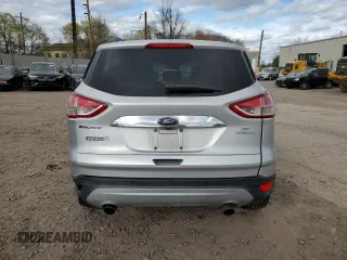 2016 Ford Escape SE with VIN 1FMCU0GX3GUC49752, listed as a Copart auction lot 52878755 with 75,424 mi miles and Salvage Title. Bid and sale history available at carsss.com. Image 6.