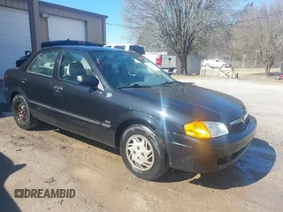 2000 Mazda Protege DX with VIN JM1BJ2227Y0303448, listed as a IAAI auction lot 41482747 with 206,542 mi miles and . Bid and sale history available at DreamBid. Image 1.