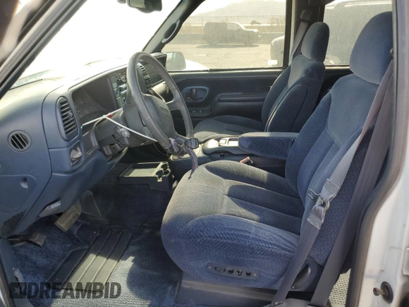 1999 GMC Suburban with VIN 3GKEC16R6XG538009, listed as a Copart auction lot 87112424 with 220,487 mi miles and Clean Title. Bid and sale history available at DreamBid. Image 7.