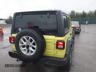 2023 Jeep Wrangler Sport with VIN 1C4HJXDG9PW631109, listed as a IAAI auction lot 41149861 with 27,570 mi miles and . Bid and sale history available at DreamBid. Image 4.