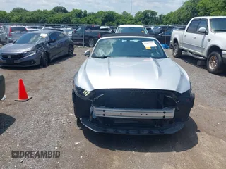 2017 Ford Mustang EcoBoost Premium z VIN 1FATP8UH6H5279739, wystawiony jako IAAI lot #42647755 z przebiegiem 91 724 mil mil oraz . Historia ofert i sprzedaży dostępna na DreamBid. Obrazek 12.
