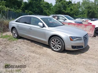 2013 Audi A8 3.0L z VIN WAURGAFD6DN004126, wystawiony jako IAAI lot #42381309 z przebiegiem 150 294 mil mil oraz . Historia ofert i sprzedaży dostępna na DreamBid. Obrazek 1.