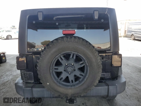 2011 Jeep Wrangler Unlimited Rubicon with VIN 1J4HA6H1XBL589103, listed as a Copart auction lot 59371155 with 156,320 mi miles and Salvage title. Bid and sale history available at DreamBid. Image 6.
