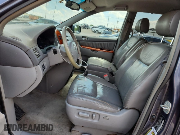 2008 Toyota Sienna XLE with VIN 5TDZK22C88S108444, listed as a Copart auction lot 64897795 with 182,584 mi miles and Clean title. Bid and sale history available at DreamBid. Image 7.